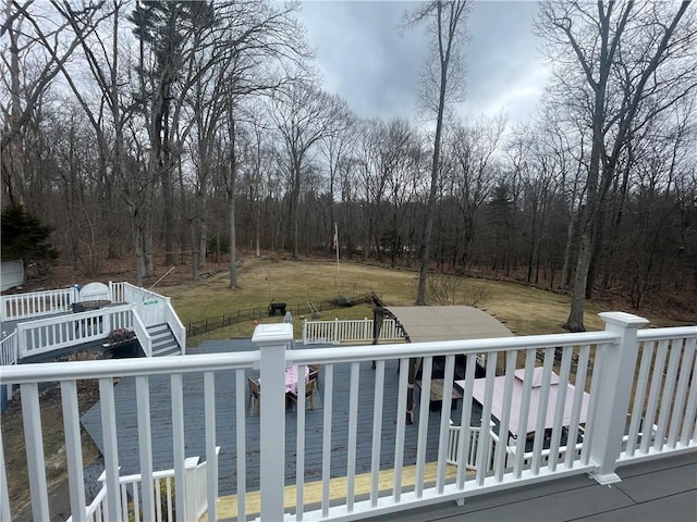 840 S Main St, Burrillville, RI 02859 - wooden deck with stairway, a wooded view, and an outbuilding