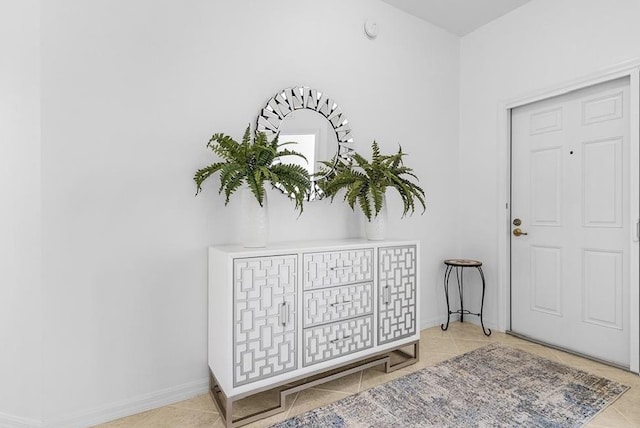 entryway featuring light tile patterned floors