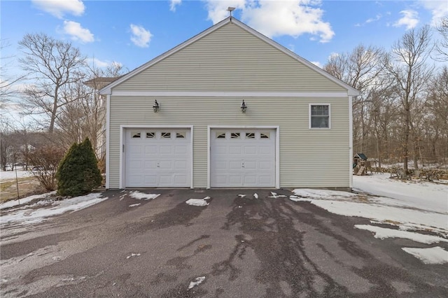 view of snow covered garage