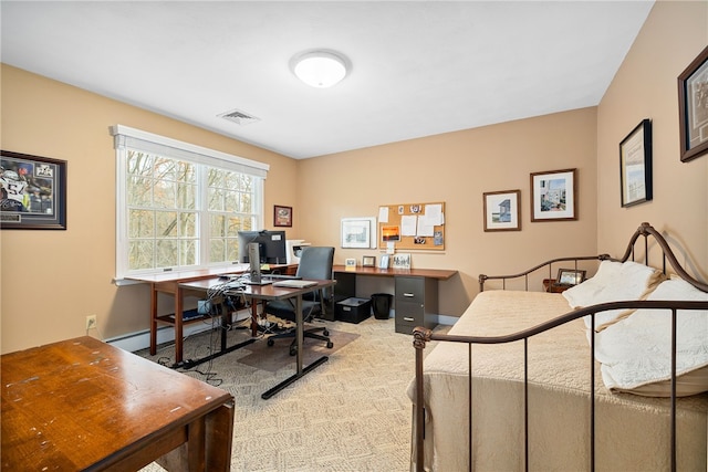 carpeted bedroom with visible vents and baseboards