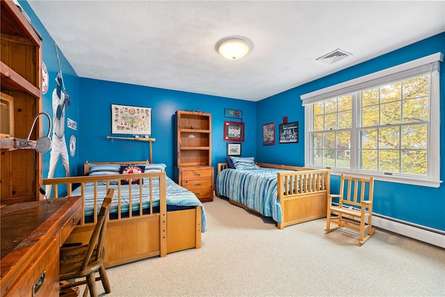 bedroom featuring carpet and visible vents