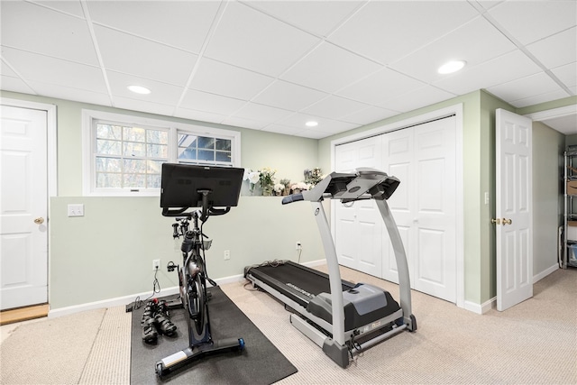 exercise area with baseboards, carpet flooring, and recessed lighting