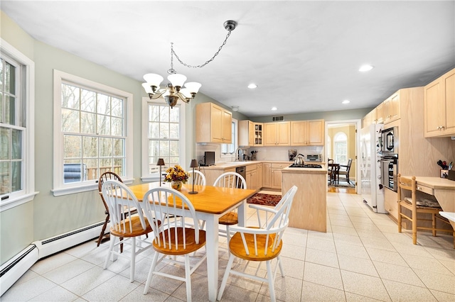 dining area featuring light tile patterned floors, recessed lighting, visible vents, and an inviting chandelier