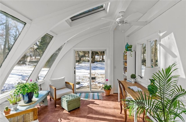 sunroom / solarium with plenty of natural light and a ceiling fan