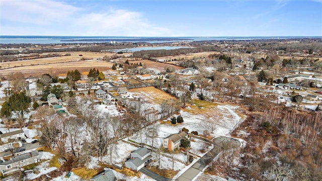 snowy aerial view featuring a residential view