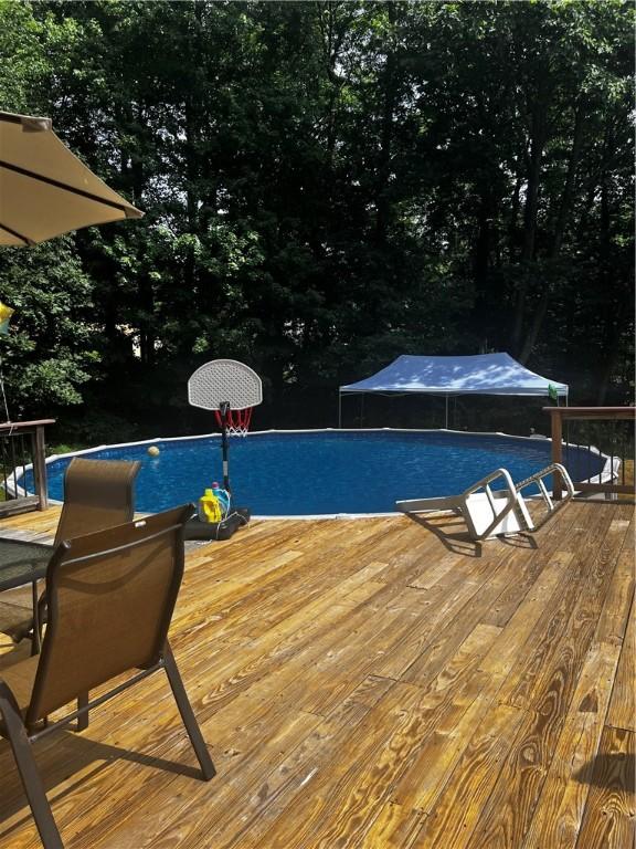 pool featuring a wooden deck