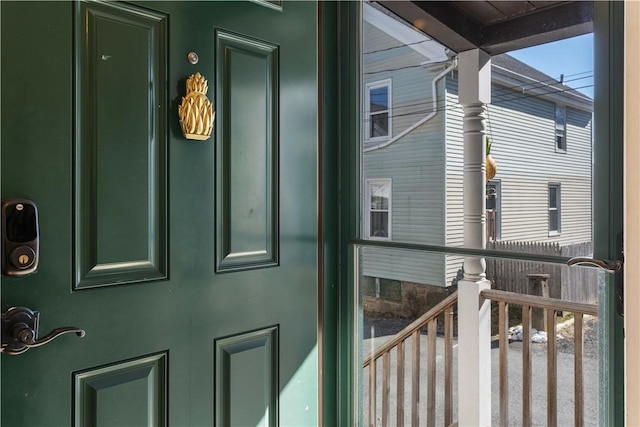 view of exterior entry with stucco siding