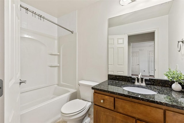 bathroom with toilet, vanity, and bathing tub / shower combination