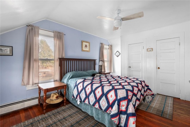 bedroom with lofted ceiling, a baseboard radiator, ceiling fan, and dark wood-type flooring