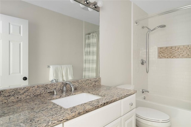 full bathroom with toilet, vanity, and shower / tub combo with curtain