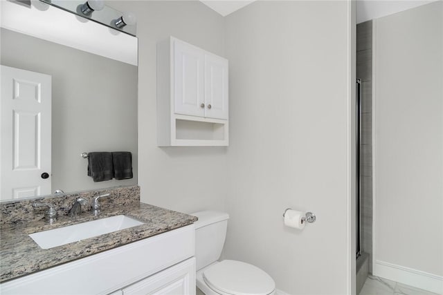 full bathroom with toilet, a shower with shower door, vanity, baseboards, and marble finish floor