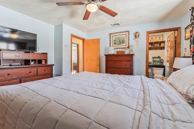 bedroom with visible vents and ceiling fan