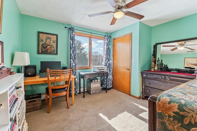 bedroom with a ceiling fan and light colored carpet