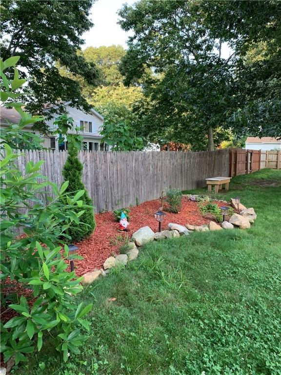 view of yard with fence