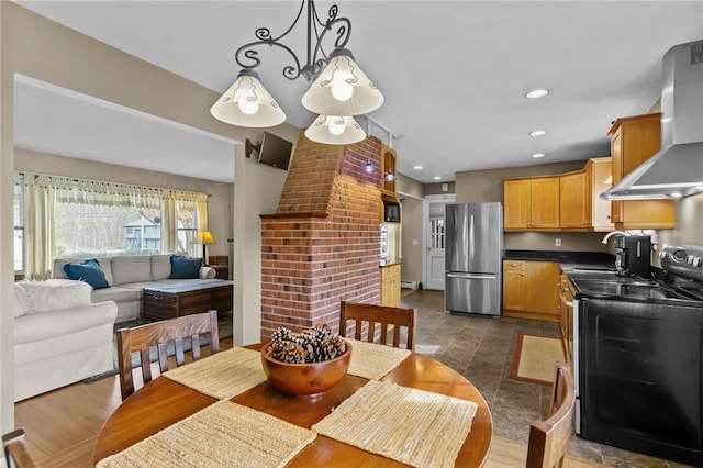 dining area featuring recessed lighting