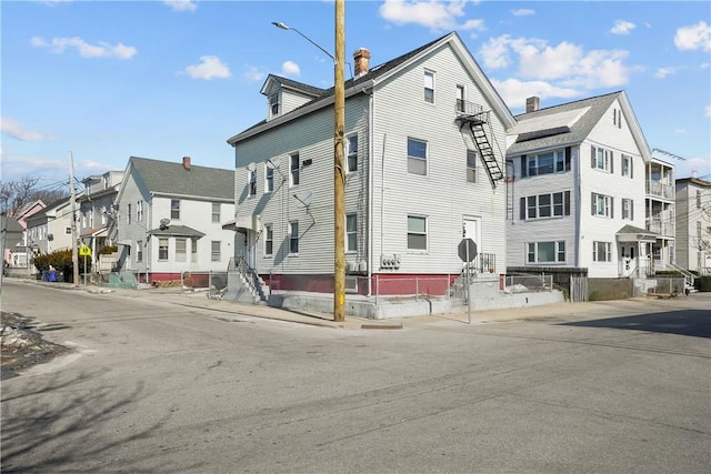 view of building exterior with a residential view