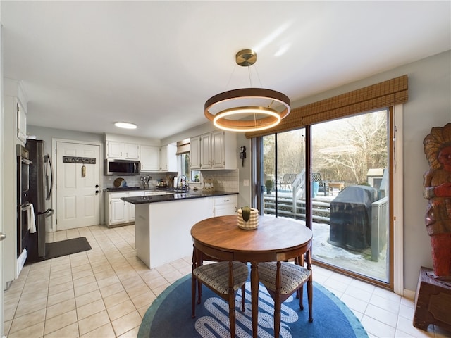 dining room with light tile patterned floors