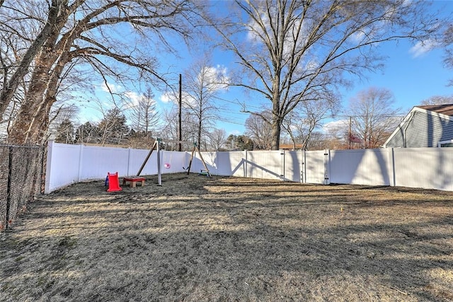 view of yard featuring a fenced backyard