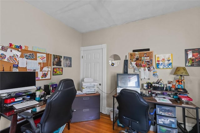 office area with wood finished floors