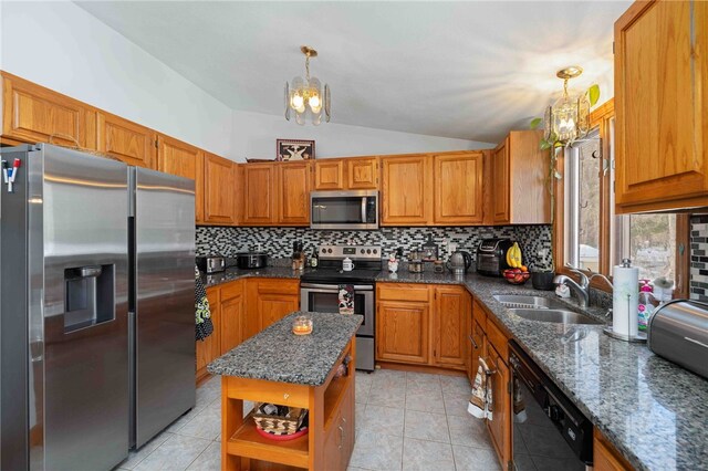 kitchen with appliances with stainless steel finishes, pendant lighting, a chandelier, and open shelves