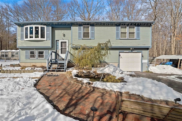 split foyer home with an attached garage