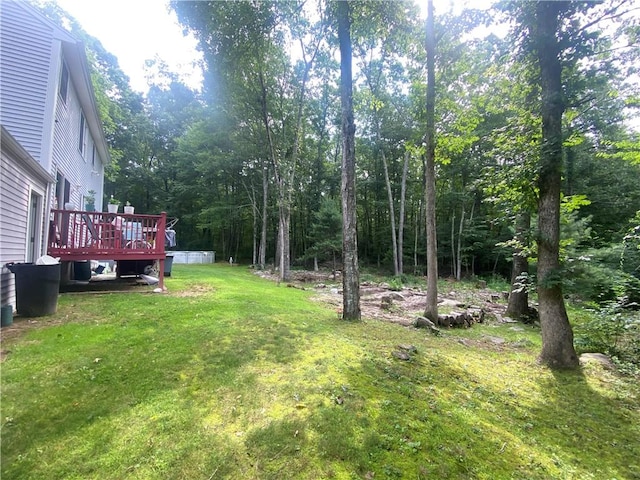 view of yard featuring a deck