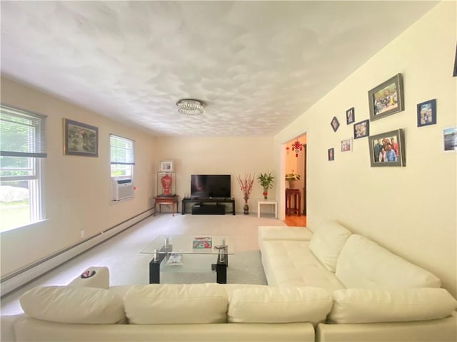 living area with baseboard heating and cooling unit