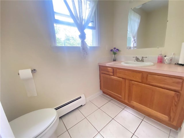 bathroom featuring toilet, a baseboard radiator, tile patterned flooring, and vanity