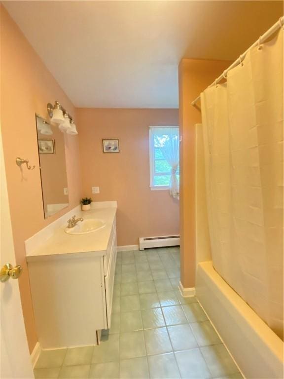 bathroom featuring baseboards, tile patterned floors, shower / bathtub combination with curtain, baseboard heating, and vanity