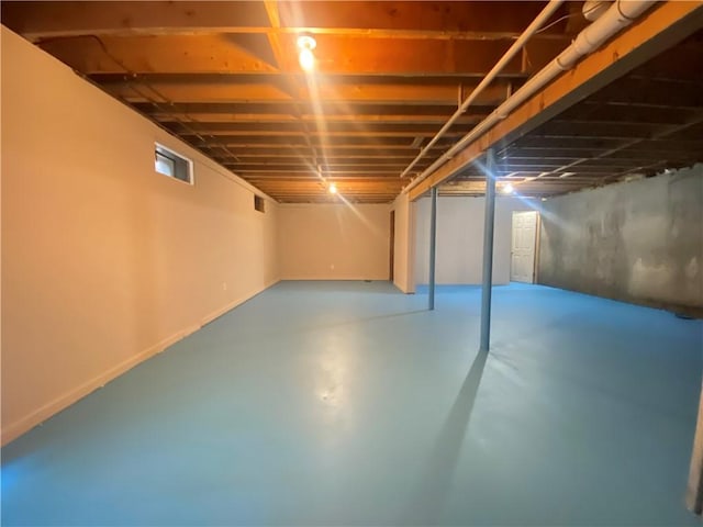 unfinished basement with baseboards