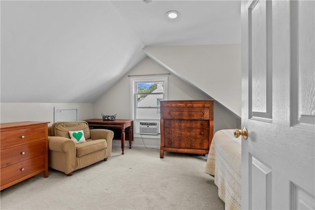 bedroom with light carpet and lofted ceiling