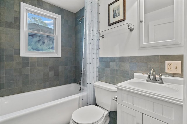 full bathroom featuring toilet, shower / tub combo, tile walls, and vanity