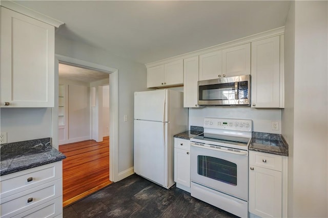 kitchen featuring white appliances, baseboards, white cabinetry, and dark wood finished floors