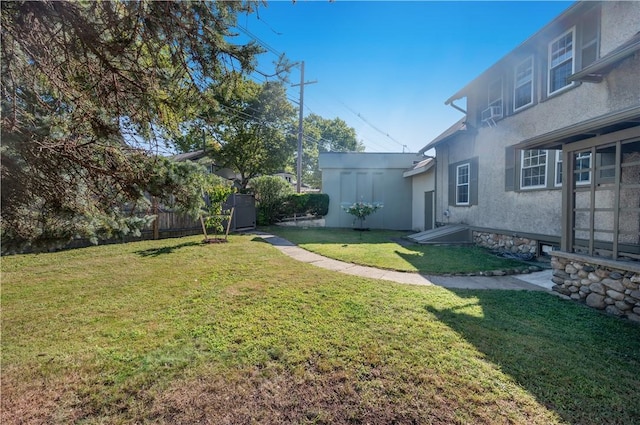 view of yard featuring fence