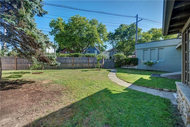 view of yard featuring a fenced backyard