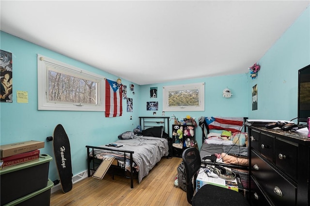 bedroom with light wood finished floors