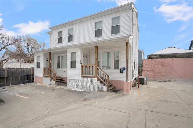 100 Penn St, Providence, RI 02909 - view of front facade with central AC and fence
