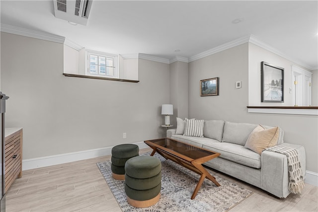 living area featuring light wood-type flooring, visible vents, crown molding, and baseboards