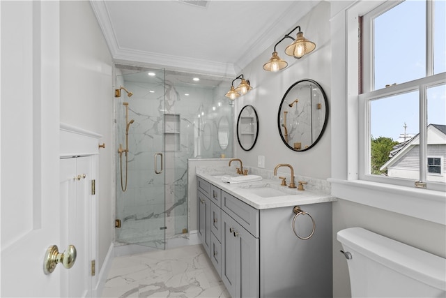 full bathroom with marble finish floor, crown molding, a marble finish shower, and a sink