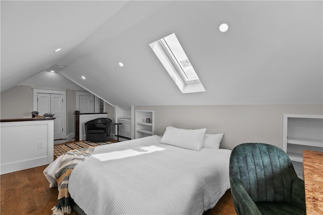 bedroom with dark wood-type flooring, recessed lighting, and lofted ceiling with skylight