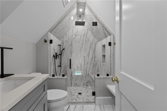 full bath featuring marble finish floor, a marble finish shower, lofted ceiling, toilet, and vanity