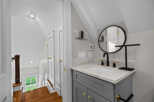 bathroom featuring recessed lighting and vanity