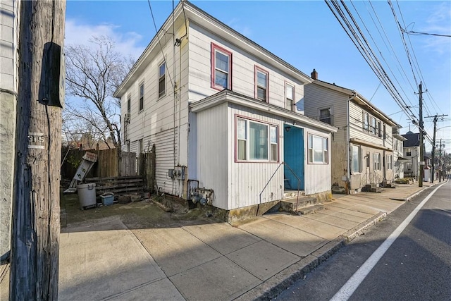 view of front of property with fence