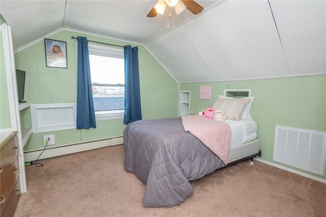 bedroom featuring lofted ceiling, a baseboard radiator, visible vents, and light colored carpet