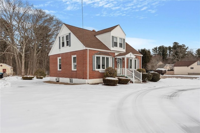 view of front of property featuring brick siding