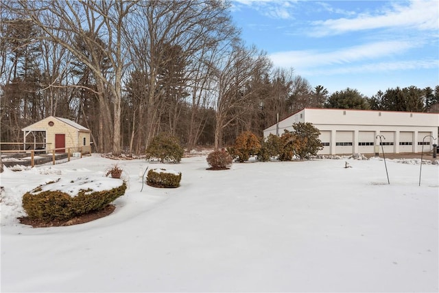 view of yard layered in snow