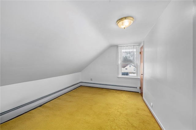 bonus room with baseboards, carpet flooring, vaulted ceiling, and baseboard heating