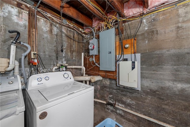 clothes washing area with laundry area, electric panel, and washer and dryer