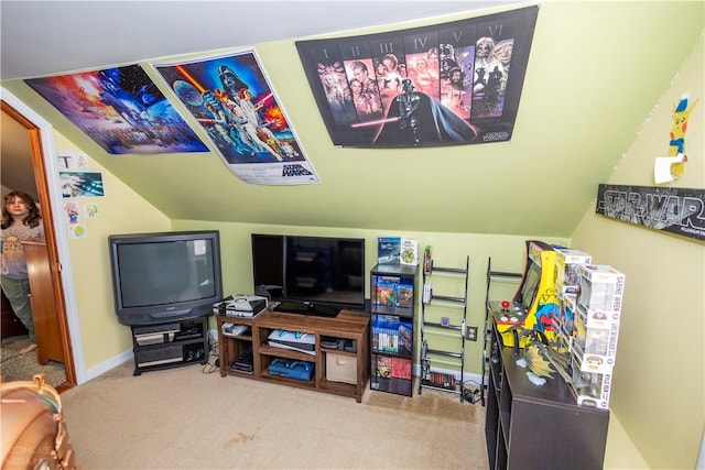 rec room with carpet floors, vaulted ceiling, and baseboards