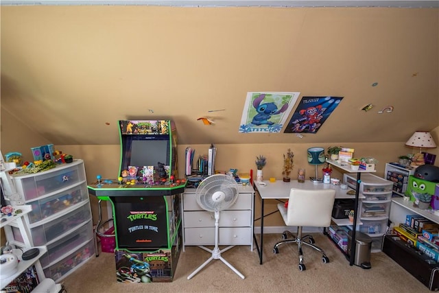 recreation room with vaulted ceiling and carpet flooring